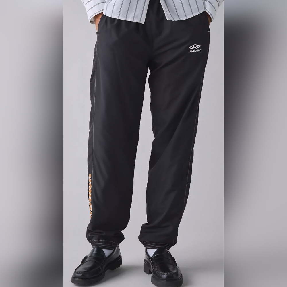 Umbro UO Exclusive Relaxed Wind Pant, Large, Black/Golden Yellow, Retail $80.00
